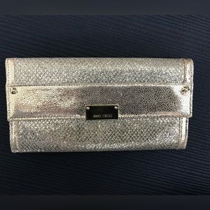 jimmy Choo clutch purse.  Silver and gold. Wallet style.